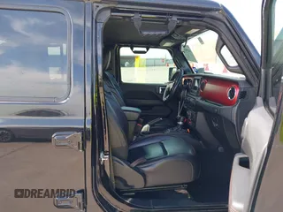 2021 Jeep Gladiator Rubicon z VIN 1C6JJTBG6ML535939, wystawiony jako IAAI lot #42260764 z przebiegiem 114 060 mil mil oraz . Historia ofert i sprzedaży dostępna na DreamBid. Obrazek 5.