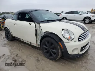2014 MINI Cooper Coupe with VIN WMWSX1C53ET507947, listed as a Copart auction lot 42087585 with 113,068 mi miles and Salvage Title. Bid and sale history available at carsss.com. Image 4.