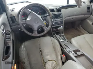 2000 Nissan Maxima GXE with VIN JN1CA31A1YT223132, listed as a Copart auction lot 60148655 with 269,258 mi miles and Salvage title. Bid and sale history available at DreamBid. Image 8.