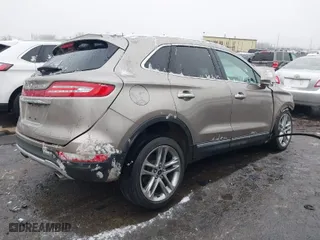 2019 Lincoln MKC Reserve with VIN 5LMCJ3D97KUL52422, listed as a IAAI auction lot 41679002 with 49,968 mi miles. Bid and sale history available at carsss.com. Image 4.