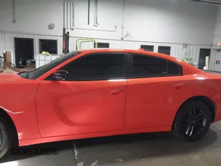 2019 Dodge Charger SXT with VIN 2C3CDXJG8KH712474, listed as a IAAI auction lot 41228985 with 117,229 mi miles and . Bid and sale history available at DreamBid. Image 6.