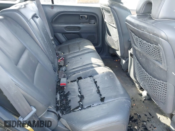 2006 Honda Pilot EX-L with VIN 5FNYF18656B012252, listed as a IAAI auction lot 41801738 with 246,191 mi miles and . Bid and sale history available at DreamBid. Image 8.