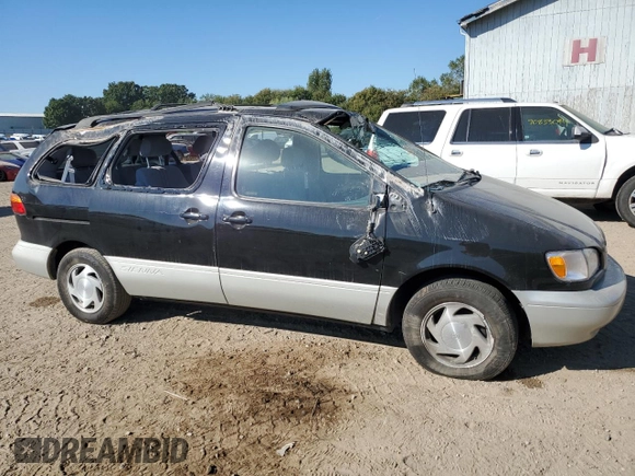2000 Toyota Sienna LE with VIN 4T3ZF13C5YU287280, listed as a Copart auction lot 71397554 with 162,851 mi miles and Clean Title. Bid and sale history available at carsss.com. Image 4.