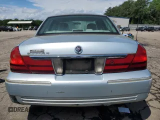 2005 Mercury Grand Marquis GS z VIN 2MEFM74W45X611002, wystawiony jako Copart lot #56645615 z przebiegiem 141 059 mil mil oraz Tytuł czysty. Historia ofert i sprzedaży dostępna na DreamBid. Obrazek 6.
