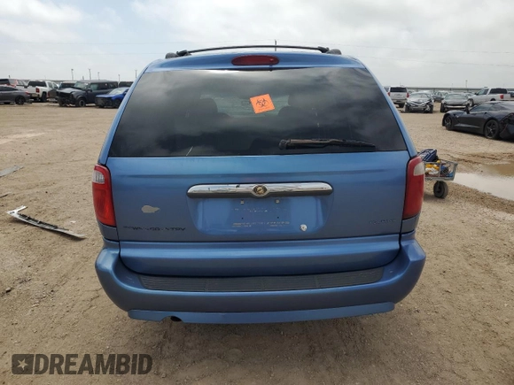 2007 Chrysler Town & Country Touring z VIN 2A4GP54L27R183214, wystawiony jako Copart lot #53818285 z przebiegiem Nie podano mil oraz Szkoda całkowita • Salvage title. Historia ofert i sprzedaży dostępna na DreamBid. Obrazek 6.