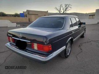 1988 Mercedes-Benz 420 with VIN WDBCA35D5JA396542, listed as a Copart auction lot 82494144 with 160,735 mi miles and Clean Title. Bid and sale history available at carsss.com. Image 4.