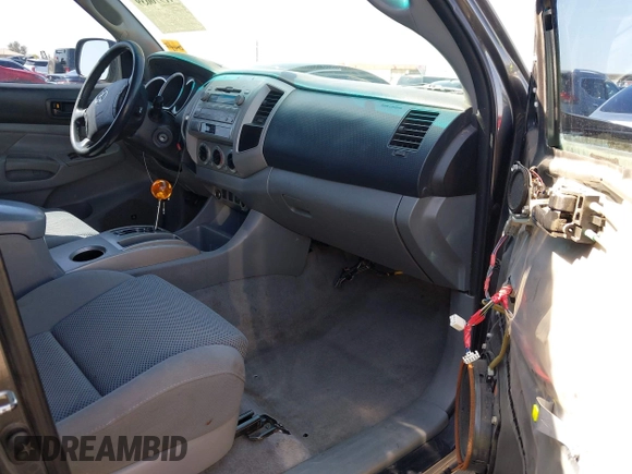 2011 Toyota Tacoma PreRunner with VIN 3TMJU4GN4BM114858, listed as a IAAI auction lot 41976639 with 296,849 mi miles and . Bid and sale history available at DreamBid. Image 5.