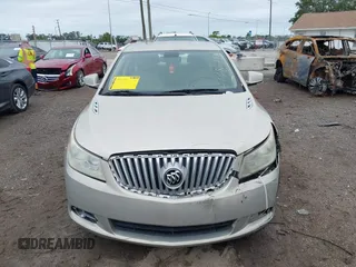 2011 Buick LaCrosse CXS with VIN 1G4GE5ED4BF301990, listed as a IAAI auction lot 41987714 with 144,554 mi miles and . Bid and sale history available at DreamBid. Image 12.