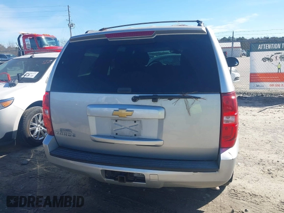 2013 Chevrolet Tahoe LS with VIN 1GNSCAE00DR361459, listed as a IAAI auction lot 41614458 with 171,925 mi miles and . Bid and sale history available at DreamBid. Image 16.