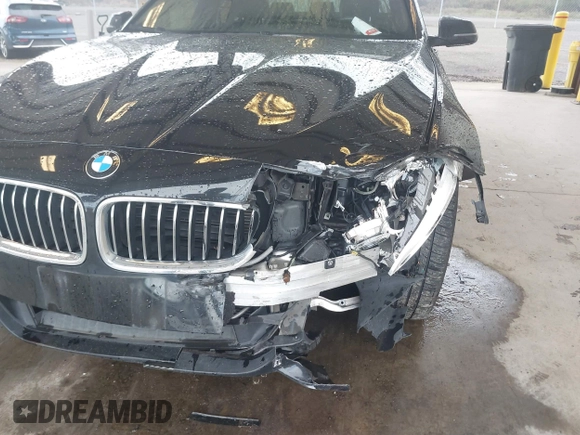 2016 BMW 5 Series 535i with VIN WBA5B1C57GG553465, listed as a IAAI auction lot 41893378 with 77,461 mi miles and . Bid and sale history available at DreamBid. Image 6.