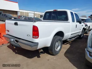 2000 Ford Super Duty F-250 XL with VIN 1FTNX20F6YEB54843, listed as a IAAI auction lot 41818448 with 225,355 mi miles. Bid and sale history available at carsss.com. Image 4.
