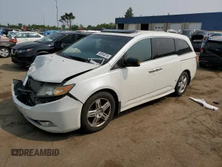 2012 Honda Odyssey Touring with VIN 5FNRL5H95CB065401, listed as a Copart auction lot 59554015 with Not provided miles and Clean title. Bid and sale history available at DreamBid. Image 1.