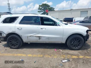 2015 Dodge Durango SXT with VIN 1C4RDHAG6FC145573, listed as a IAAI auction lot 42300420 with 134,684 mi miles and . Bid and sale history available at DreamBid. Image 18.