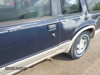 1991 Ford Explorer z VIN 1FMCU24X0MUA91155, wystawiony jako IAAI lot #42314856 z przebiegiem 75 836 mil mil oraz . Historia ofert i sprzedaży dostępna na DreamBid. Obrazek 6.