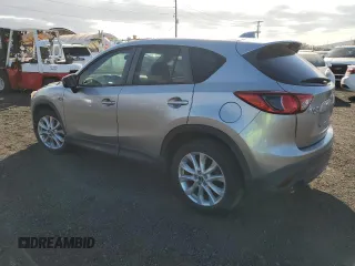 2013 Mazda CX-5 Grand Touring with VIN JM3KE4DE5D0101104, listed as a Copart auction lot 84828824 with 56,453 mi miles and Non Repairable. Bid and sale history available at carsss.com. Image 2.