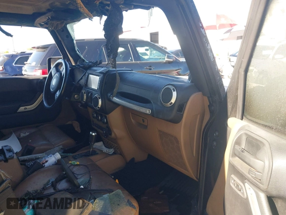 2011 Jeep Wrangler Unlimited Rubicon with VIN 1J4BA6H16BL615945, listed as a IAAI auction lot 42159418 with Not provided miles and . Bid and sale history available at DreamBid. Image 5.