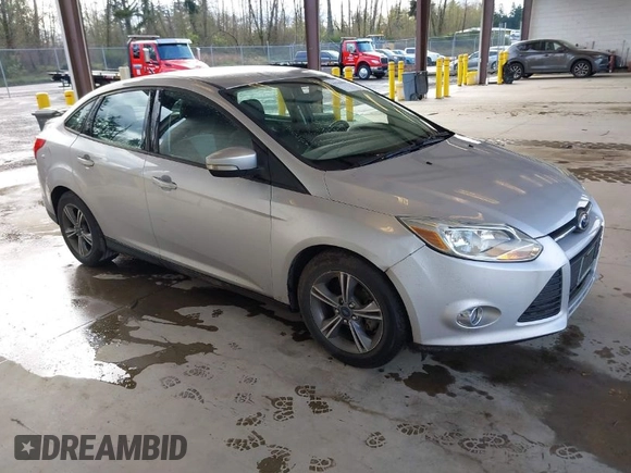2014 Ford Focus SE with VIN 1FADP3F28EL433519, listed as a IAAI auction lot 41969007 with 137,064 mi miles. Bid and sale history available at carsss.com. Image 1.
