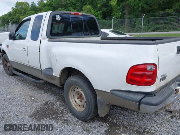 2003 Ford F-150 XL with VIN 1FTRX07WX3KD86058, listed as a IAAI auction lot 42502946 with Not provided miles and . Bid and sale history available at DreamBid. Image 3.