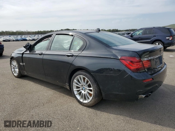 2015 BMW 7 Series 750i xDrive with VIN WBAYB6C59FD965994, listed as a Copart auction lot 53994545 with 119,929 mi miles and Salvage Title. Bid and sale history available at carsss.com. Image 2.