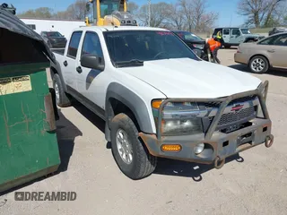 2007 Chevrolet Colorado 1LT z VIN 1GCDT13E978225745, wystawiony jako IAAI lot #42046972 z przebiegiem 143 940 mil mil oraz . Historia ofert i sprzedaży dostępna na DreamBid. Obrazek 1.