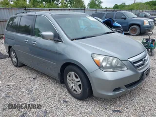 2005 Honda Odyssey EX-L z VIN 5FNRL386X5B038143, wystawiony jako IAAI lot #42149398 z przebiegiem 243 002 mil mil oraz . Historia ofert i sprzedaży dostępna na DreamBid. Obrazek 1.