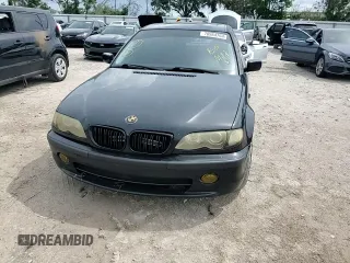 2002 BMW 3 Series 330i with VIN WBAEV53472KM01777, listed as a Copart auction lot 70984764 with 105,293 mi miles and Salvage Title. Bid and sale history available at carsss.com. Image 11.