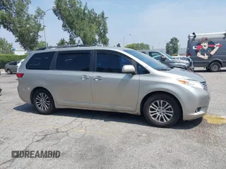 2015 Toyota Sienna XLE with VIN 5TDYK3DC4FS560743, listed as a IAAI auction lot 42488745 with 145,009 mi miles and . Bid and sale history available at DreamBid. Image 13.