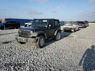 2018 Jeep Wrangler Willys Wheeler W z VIN 1C4AJWAGXJL852498, wystawiony jako Copart lot #52866945 z przebiegiem 90 515 mil mil oraz Szkoda całkowita • Salvage title. Historia ofert i sprzedaży dostępna na DreamBid. Obrazek 12.