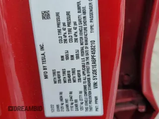 2023 Tesla Model 3 z VIN 5YJ3E1EA6PF458210, wystawiony jako Copart lot #60889235 z przebiegiem Nie podano mil oraz Szkoda całkowita • Salvage title. Historia ofert i sprzedaży dostępna na DreamBid. Obrazek 12.