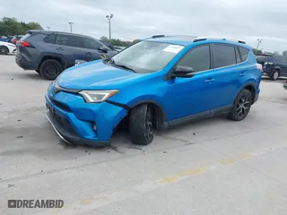 2016 Toyota RAV4 SE with VIN JTMJFREV3GJ076876, listed as a IAAI auction lot 41566899 with 133,216 mi miles. Bid and sale history available at carsss.com. Image 2.