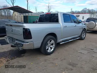 2014 Ram 1500 Big Horn with VIN 1C6RR7LM1ES370977, listed as a IAAI auction lot 41037510 with 145,692 mi miles and . Bid and sale history available at DreamBid. Image 4.