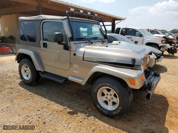 2004 Jeep Wrangler Sahara with VIN 1J4FA59S34P736690, listed as a Copart auction lot 67477694 with 85,180 mi miles and Salvage Title. Bid and sale history available at carsss.com. Image 4.