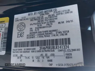 2020 Ford Fusion Titanium with VIN 3FA6P0RU8LR141324, listed as a IAAI auction lot 42004026 with 107,136 mi miles and . Bid and sale history available at DreamBid. Image 9.