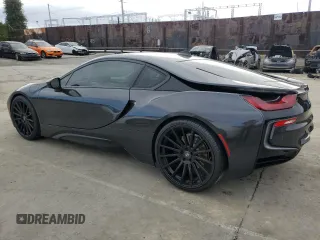 2016 BMW i8 z VIN WBY2Z2C5XGV674797, wystawiony jako Copart lot #44790384 z przebiegiem 58 006 mil mil oraz . Historia ofert i sprzedaży dostępna na DreamBid. Obrazek 2.