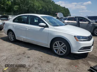 2017 Volkswagen Jetta SEL with VIN 3VWL17AJ2HM211751, listed as a Copart auction lot 61907755 with 64,668 mi miles and Salvage title. Bid and sale history available at DreamBid. Image 4.