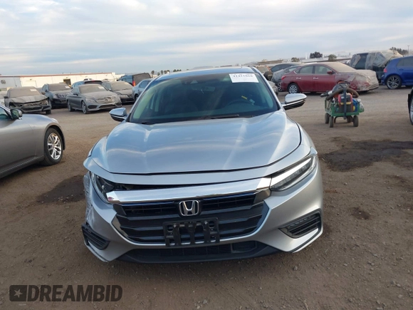 2021 Honda Insight Touring with VIN 19XZE4F99ME009749, listed as a IAAI auction lot 41411868 with 54,808 mi miles and . Bid and sale history available at carsss.com. Image 13.