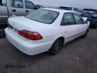 1999 Honda Accord LX с VIN JHMCG5540XC034223, выставлен на аукционе Copart как лот 83922254 с пробегом Не указан миль и Списание • Salvage title. История ставок и продаж доступна на DreamBid. Изображение 3.