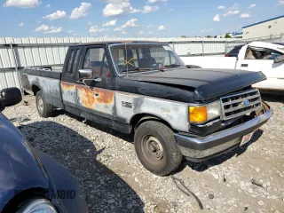 1989 Ford F-150 with VIN 1FTEX15N0KKB51052, listed as a Copart auction lot 70142074 with 74,351 mi miles and Salvage Title. Bid and sale history available at carsss.com. Image 4.