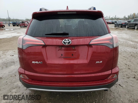 2018 Toyota RAV4 XLE with VIN JTMWFREV0JD130324, listed as a Copart auction lot 41790875 with 236,109 mi miles and Salvage title. Bid and sale history available at DreamBid. Image 6.