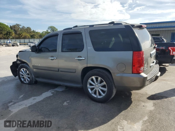 2009 GMC Yukon SLT w/4SA with VIN 1GKEC33359R222406, listed as a Copart auction lot 76913644 with 234,952 mi miles and Salvage Title. Bid and sale history available at carsss.com. Image 2.