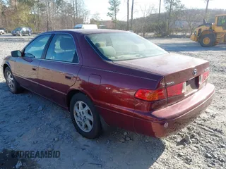 2001 Toyota Camry CE with VIN JT2BG22K710602080, listed as a IAAI auction lot 41858573 with 169,774 mi miles and . Bid and sale history available at carsss.com. Image 3.