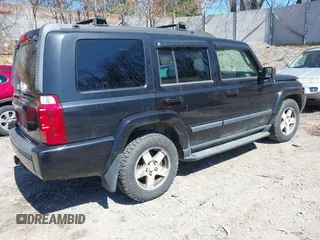 2009 Jeep Commander Sport with VIN 1J8HG48P79C541817, listed as a IAAI auction lot 41906053 with 189,436 mi miles. Bid and sale history available at carsss.com. Image 4.