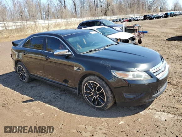 2011 Ford Taurus Limited with VIN 1FAHP2JW0BG140708, listed as a Copart auction lot 52157335 with 141,229 mi miles and Clean title. Bid and sale history available at DreamBid. Image 4.
