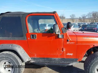 2005 Jeep Wrangler Sport with VIN 1J4FA49S85P344204, listed as a IAAI auction lot 41769319 with 105,927 mi miles. Bid and sale history available at carsss.com. Image 13.