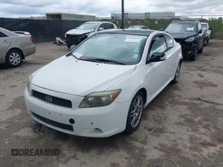 2005 Scion tC with VIN JTKDE177750015400, listed as a IAAI auction lot 39040511 with 232,749 mi miles. Bid and sale history available at carsss.com. Image 2.