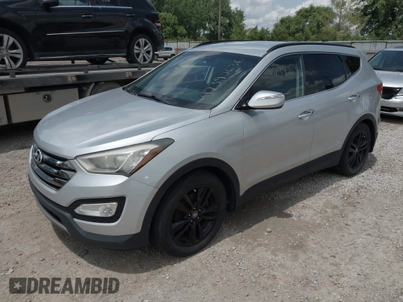 2013 Hyundai Santa Fe Sport z VIN 5XYZUDLA8DG055576, wystawiony jako IAAI lot #42392636 z przebiegiem 165 096 mil mil oraz . Historia ofert i sprzedaży dostępna na DreamBid. Obrazek 17.