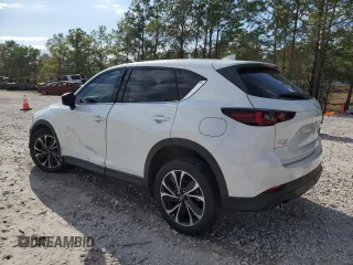 2023 Mazda CX-5 2.5 S Premium Package with VIN JM3KFBDM4P0217729, listed as a Copart auction lot 85883354 with 18,116 mi miles and Salvage Title. Bid and sale history available at carsss.com. Image 2.
