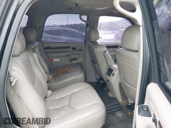 2003 Cadillac Escalade z VIN 1GYEK63N73R203813, wystawiony jako IAAI lot #42138841 z przebiegiem 68 483 mil mil oraz . Historia ofert i sprzedaży dostępna na DreamBid. Obrazek 8.