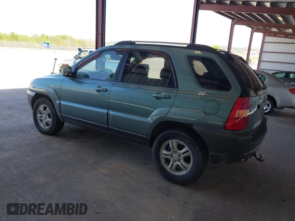 2005 Kia Sportage LX with VIN KNDJF723957065883, listed as a IAAI auction lot 42087320 with 212,726 mi miles and . Bid and sale history available at carsss.com. Image 3.