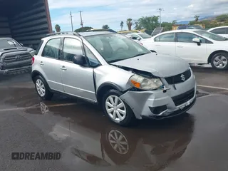 2011 Suzuki SX4 z VIN JS2YA5A36B6300041, wystawiony jako IAAI lot #40788680 z przebiegiem 53 551 mil mil oraz . Historia ofert i sprzedaży dostępna na DreamBid. Obrazek 1.